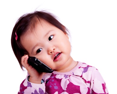 baby holding a cell phone